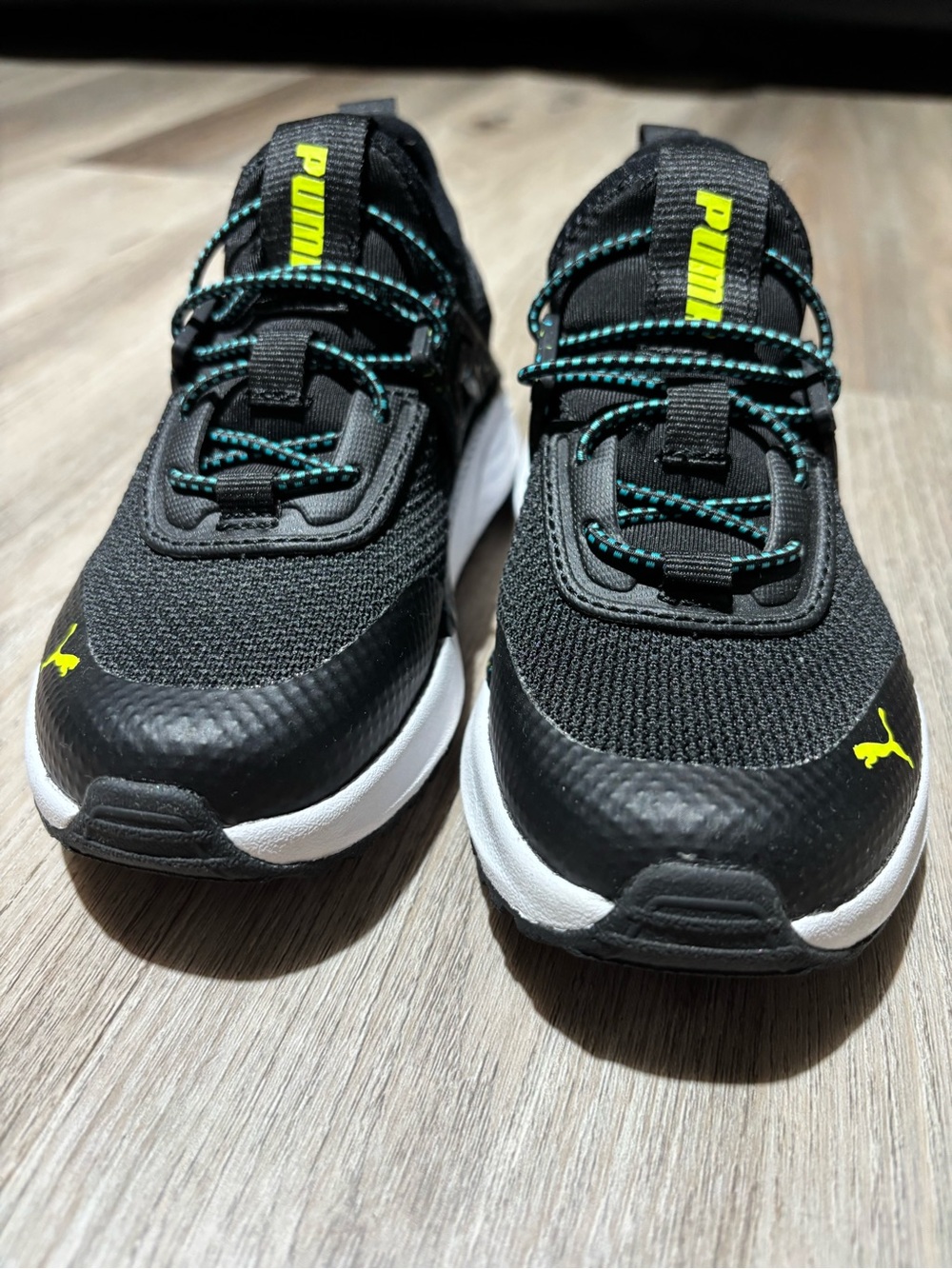 Puma Kids Black Sneakers with Neon Yellow Accents